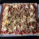 Recette de Pizza jambon, chorizo, champignons, fromage, tomate